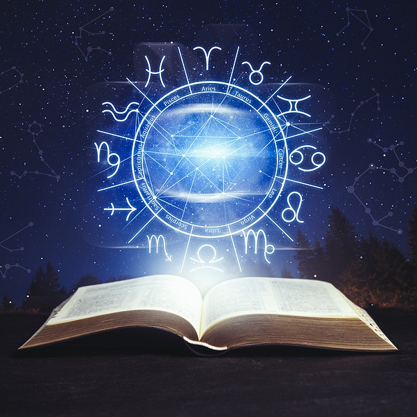 Brilliant blue astrological chart with signs floating above an open book against a black background