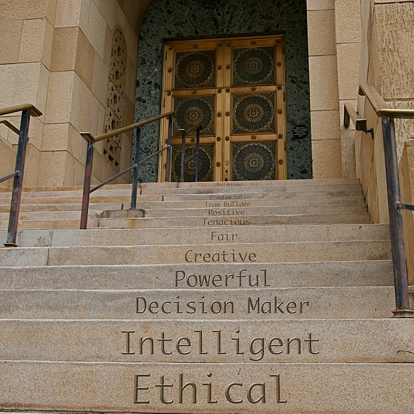 Stone stairway with words etched into them such as Ethical, Intelligent, Creative & Fair
