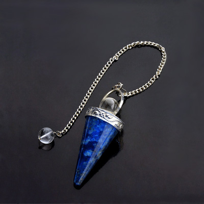 Dark blue lapis lazuli pendulum against black background