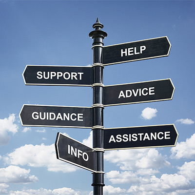 Sign post showing words Help, Advice, Support, Guidance, Assistance, and Info